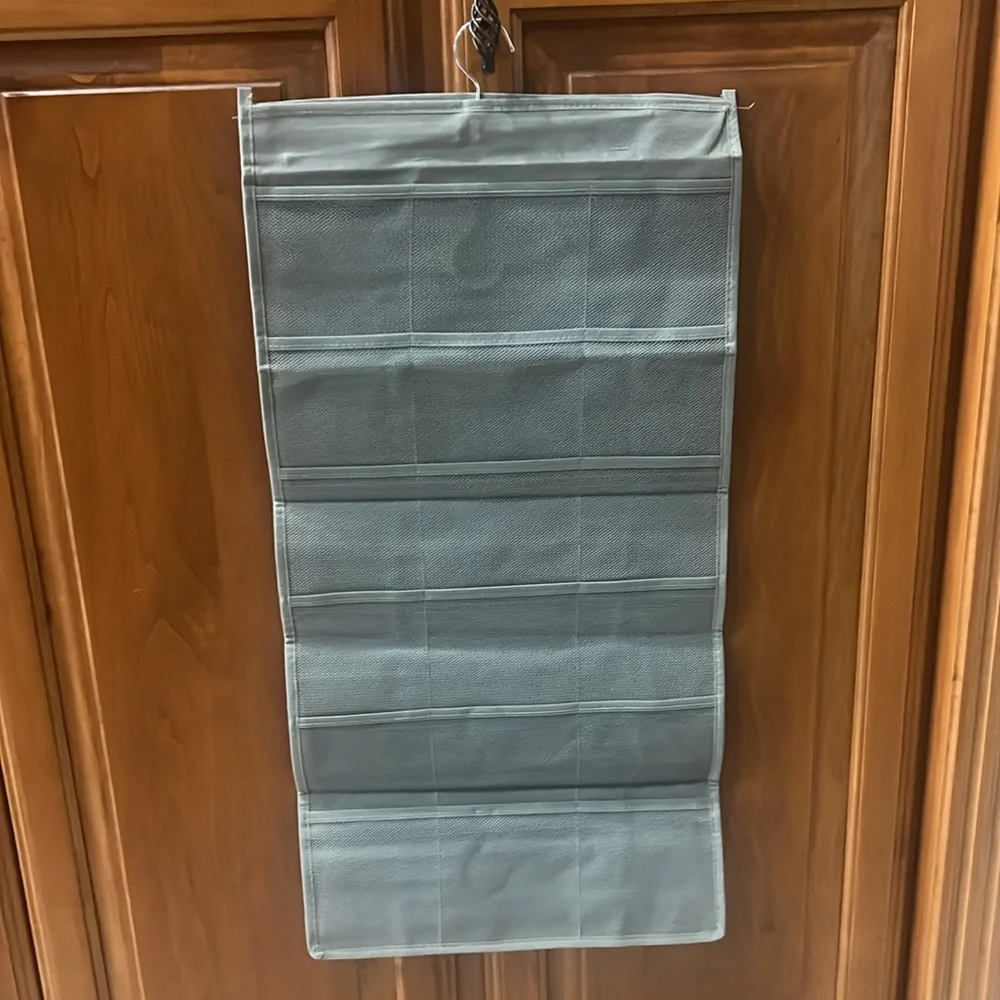 Gray Hanging organizer for closet.
